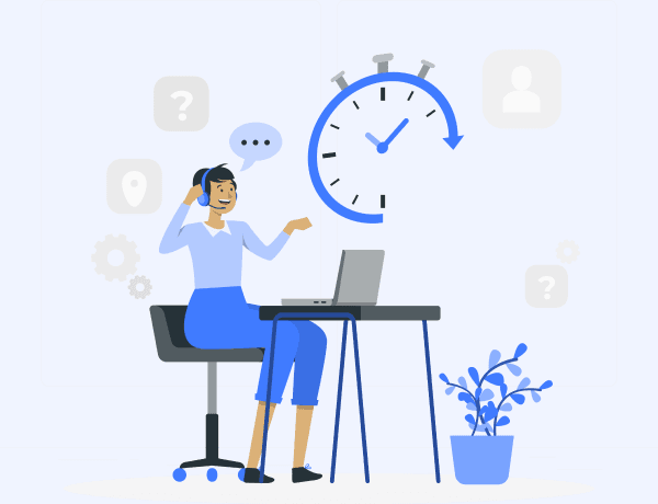 Person working at a desk with a clock in the background